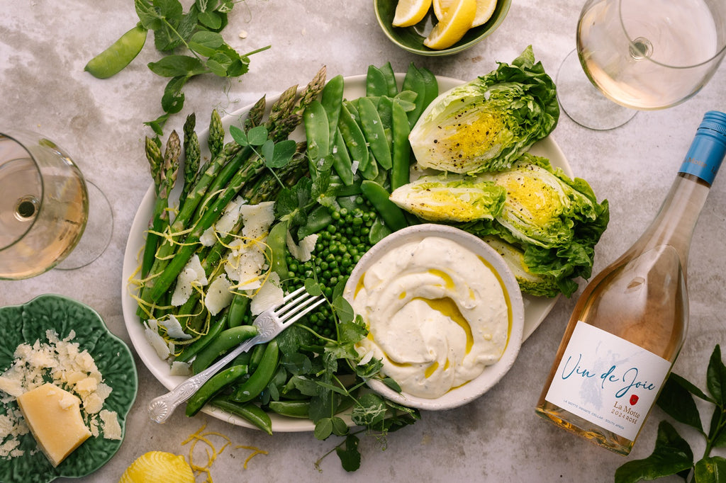 Asparagus, peas and Parmesan platter on lemony crème fraiche