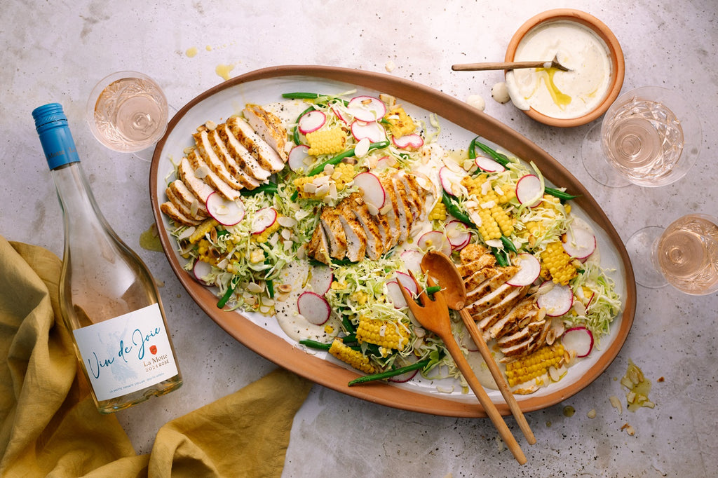 Chicken crunch salad with tahini dressing and toasted almonds