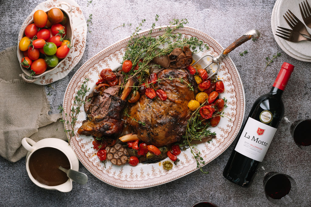 Slow Roasted Lamb Shoulder with Red Wine, Tomatoes, Baby Onions, Garlic & Thyme
